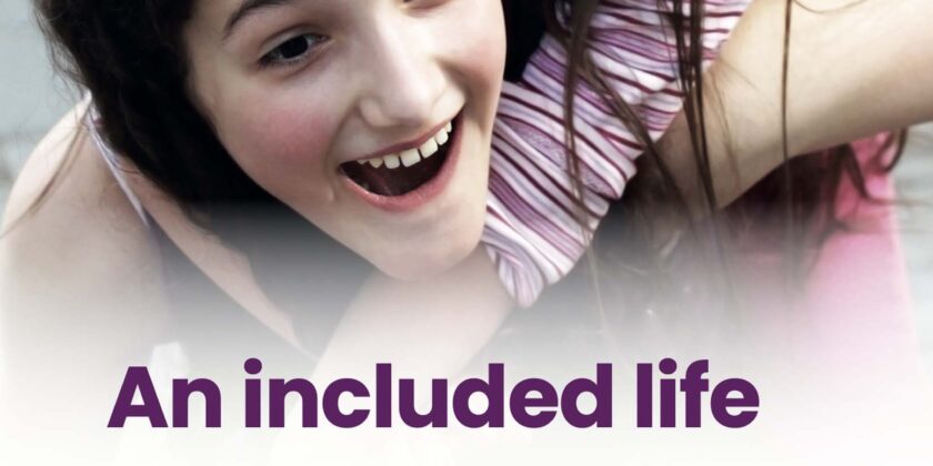 picture of happy young girl with Down syndrome holding onto an older girls shoulders