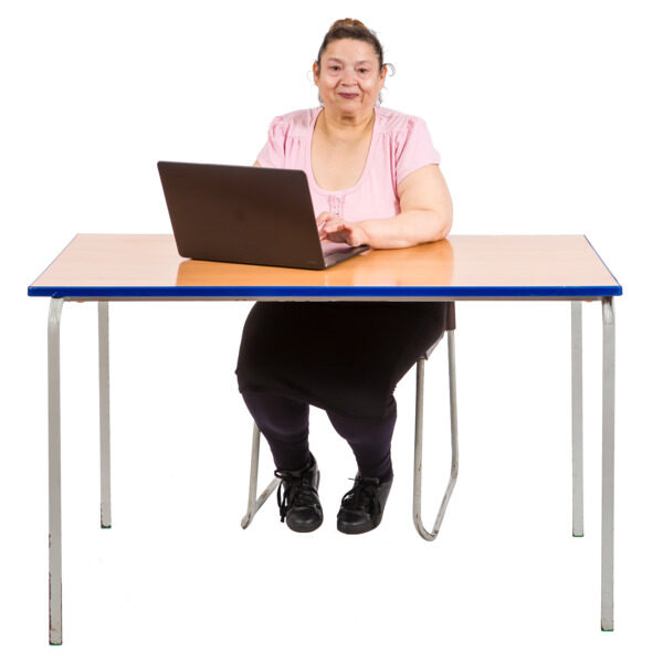 woman sitting at a desk with a computer laptop