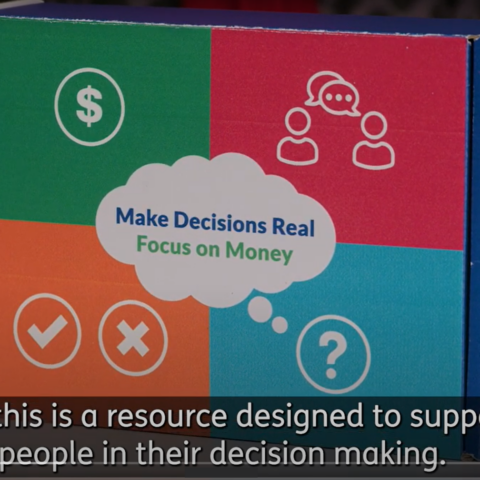 Make Decisions Real - Focus on Money conversation cards box pictured with words at bottom "and this is a resource designed to support people in their decision making".