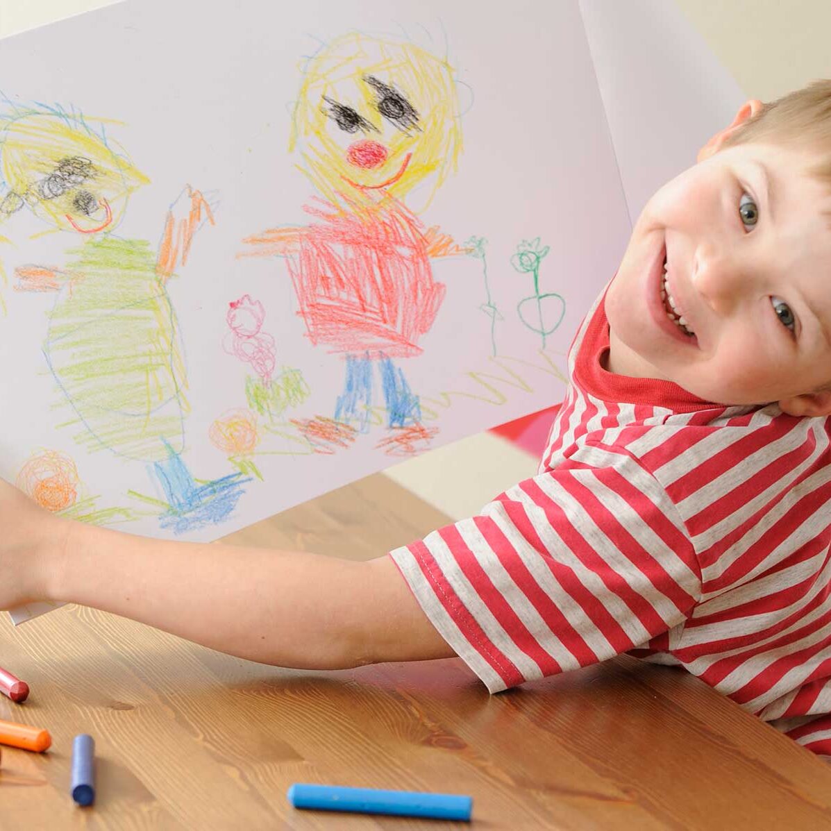 Young boy drawing