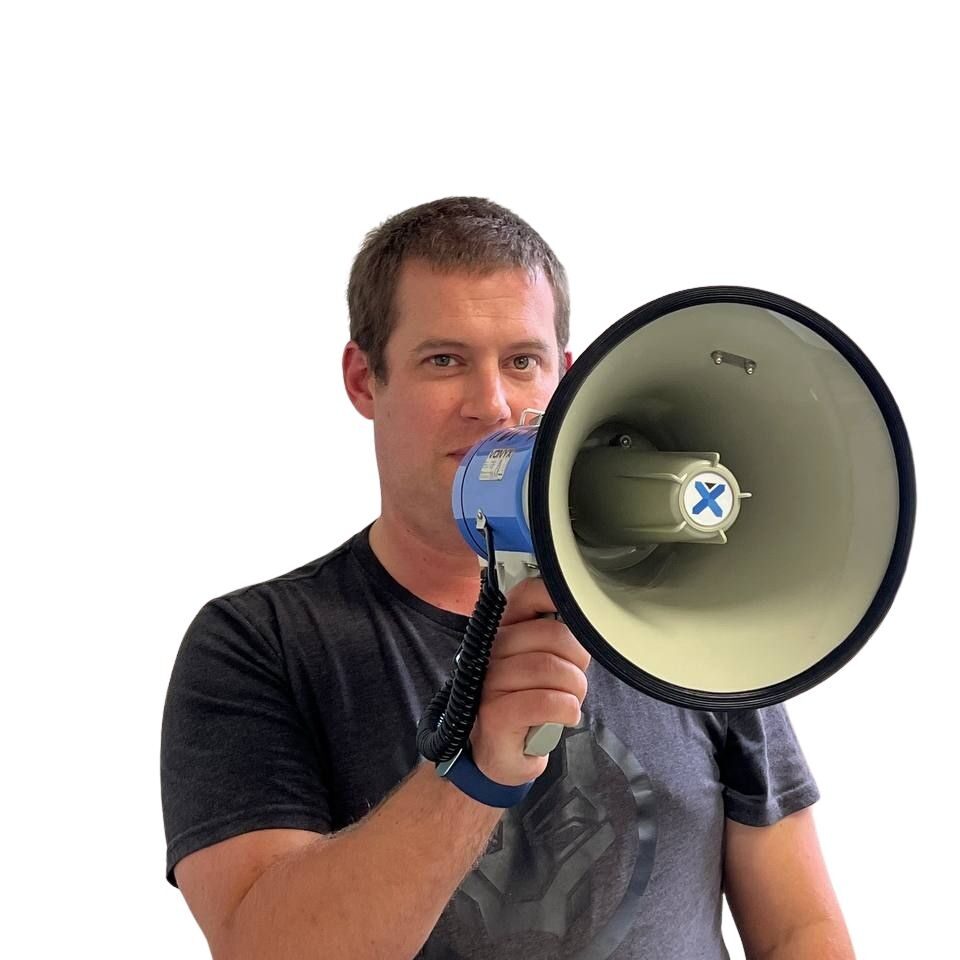 person holding a megaphone up to their mouth