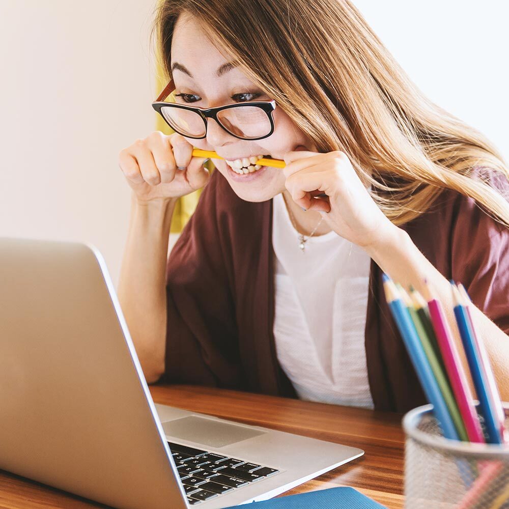 A student studying at a computer